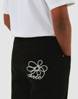 Pantalon à poches brodées