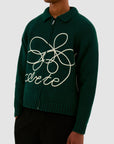 Pull en maille avec logo fleuri